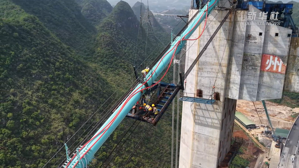 在建世界第一高桥成功拆除猫道