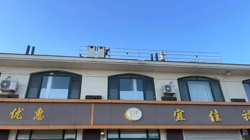 六汪镇拆除楼顶广告字守护群众头顶安全