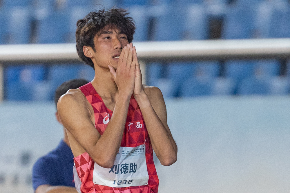 新华社记者 黄伟 摄5月28日,广西队选手刘德助因伤退出比赛.