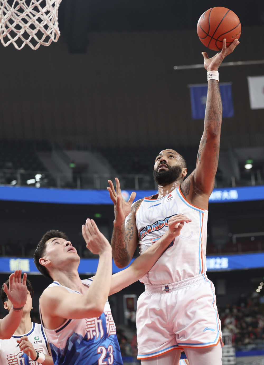 篮球cba常规赛新疆伊力特胜山东高速