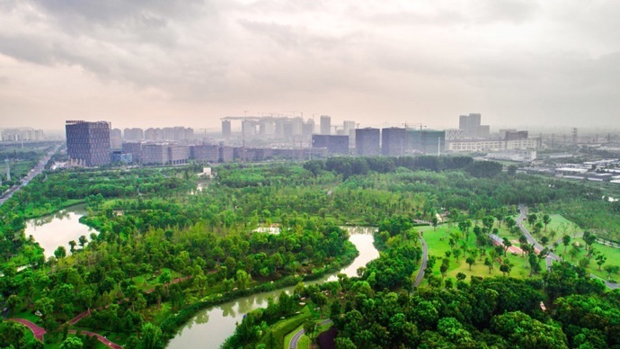 在鋼筋水泥間種出了一片綠肺松江九科綠洲從綠地成為產城融合新地標