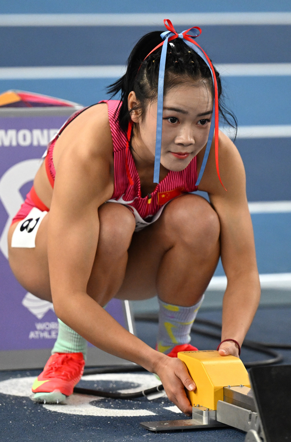 3月22日,中国选手梁小静在女子60米预赛前.最终,她晋级半决赛