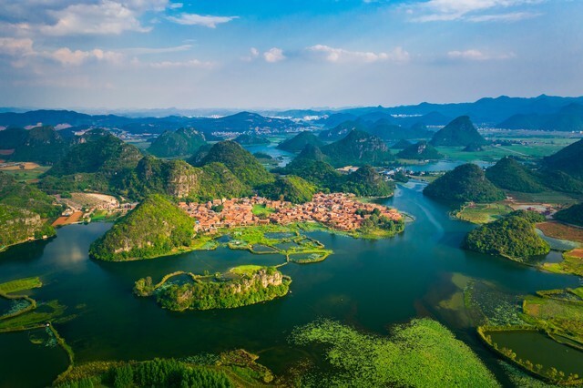 石林万家欢蓝莓庄园, 小雨转多云, 14~23度楚雄彝人古镇, 中雨转多云