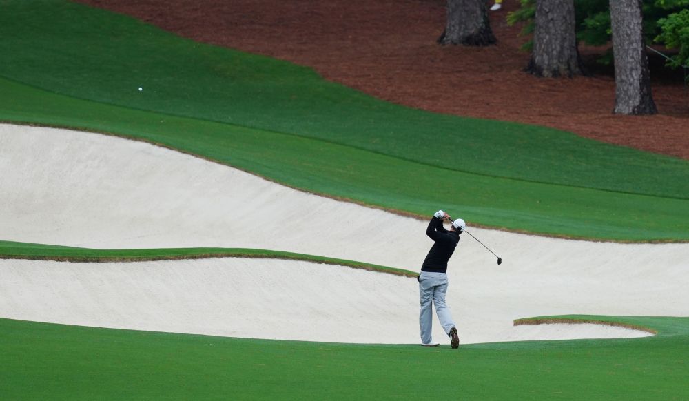 美国高尔夫球大师赛科普卡保持领先伍兹追平晋级纪录