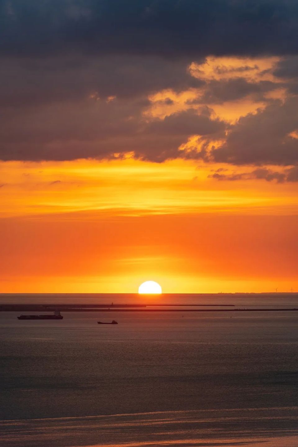 夕阳与海口经典地标同框当属海口湾海口最热门的日落打卡点都是这场