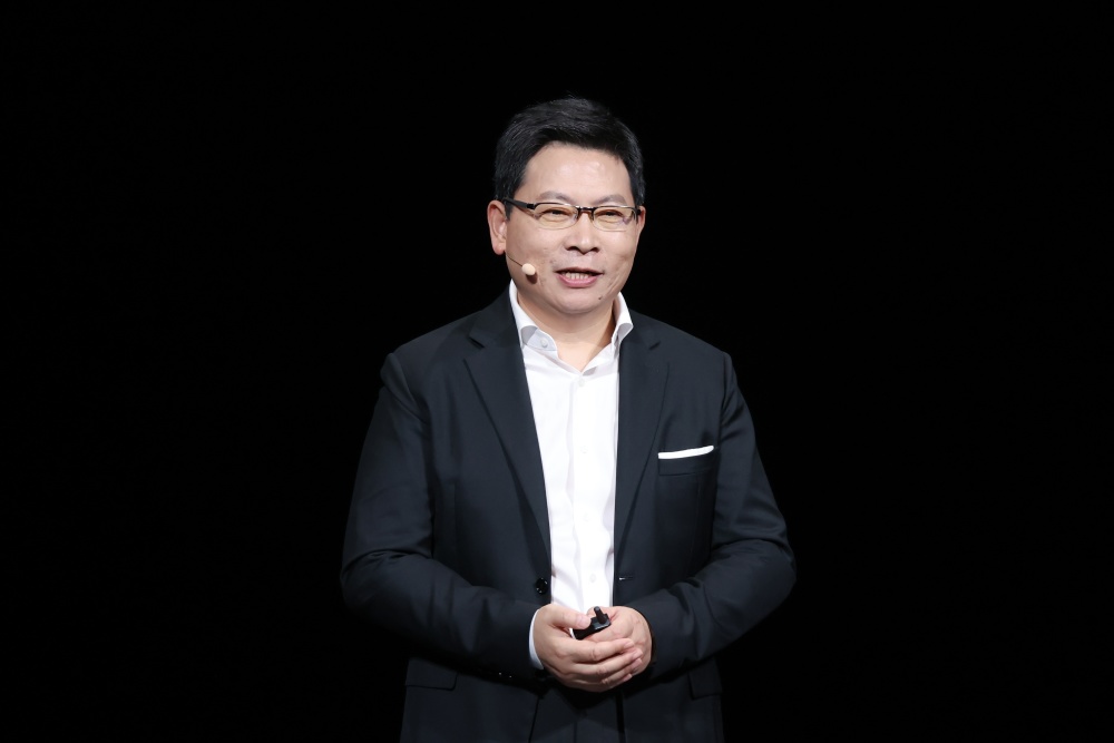 一个字没提mate60:华为发布会"低调"背后"敢于非凡"_腾讯新闻