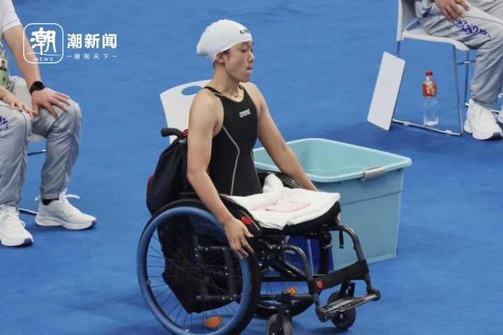 "篮球女孩"钱红艳亮相杭州亚残运会-腾讯新闻