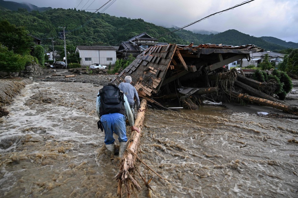 日本九州暴雨已致2人死亡多人失联-腾讯新闻