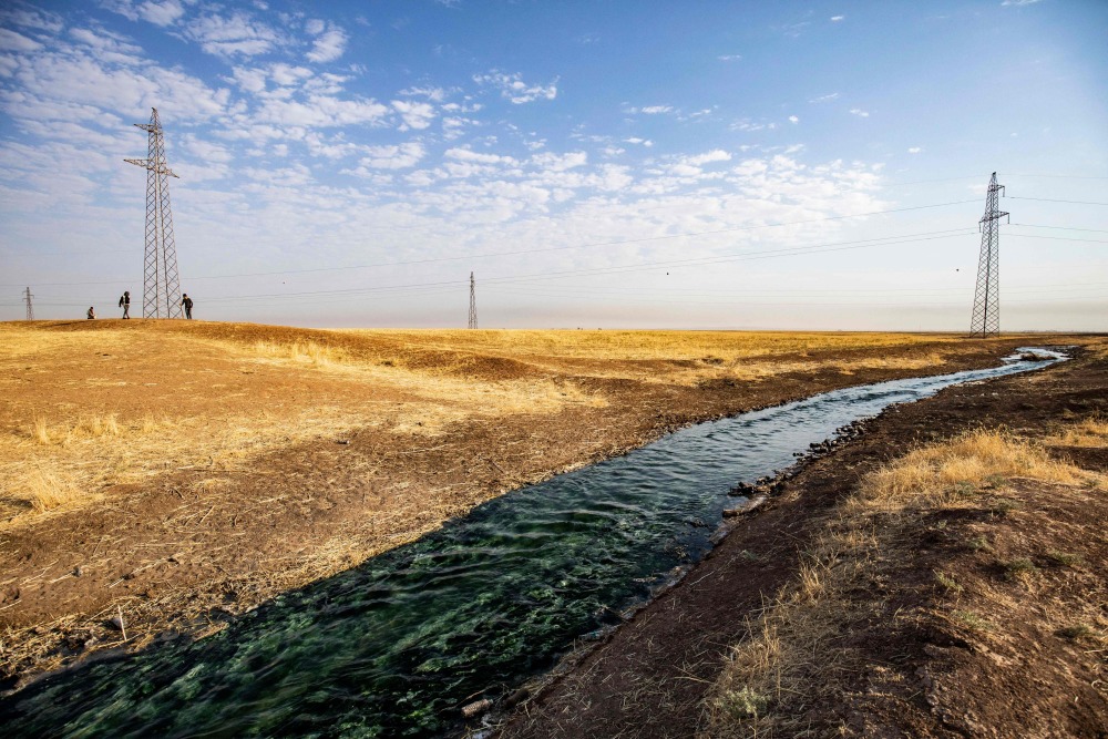 外代一线叙利亚被污染的河流