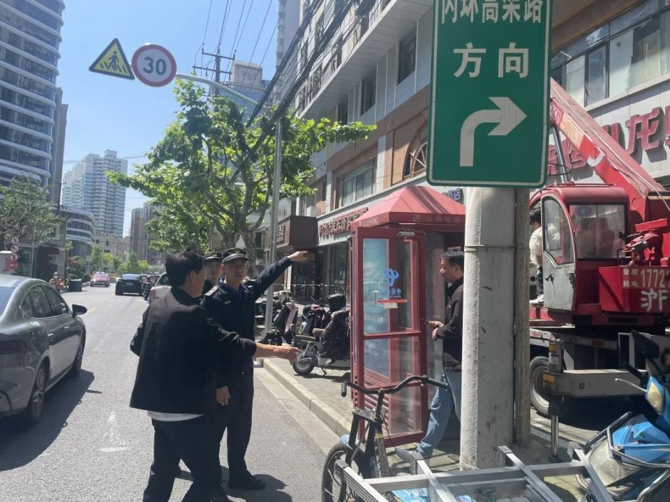 守护"头顶上的安全",天目西路街道开展户外招牌专项整治行动