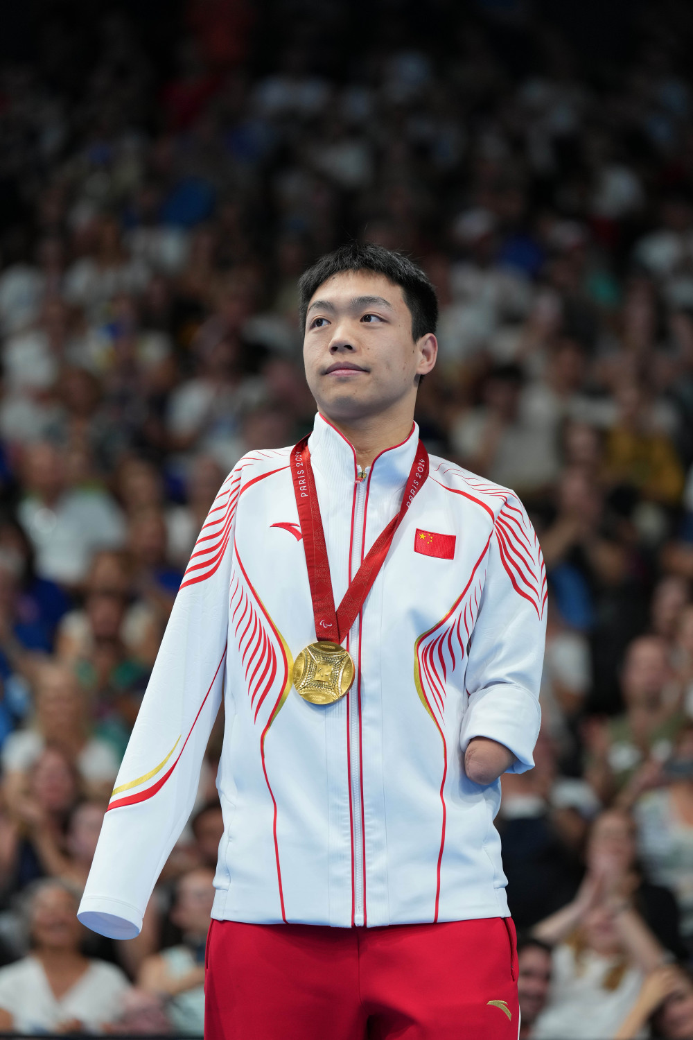 游泳——杨洪赢得男子100米蛙泳sb6级冠军并打破残奥会纪录