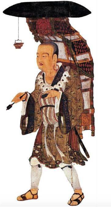 在这幅广为流传的"玄奘画像"中,一个身背经箧的行脚僧,右手持拂尘