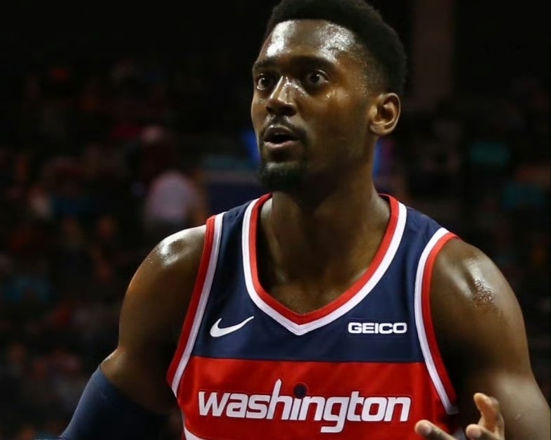 在奇才效力的七年里,他和沃尔,比尔组成了奇才自己的"三头怪",也是