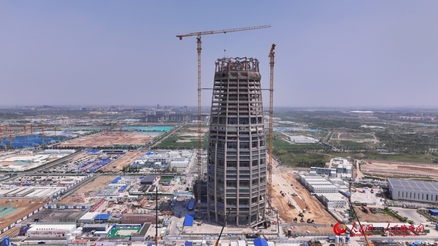 央企雄安总部建设新进展 中国中化大厦项目塔冠完成安装_腾讯新闻