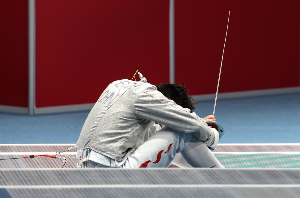 9月25日,中国选手沈晨鹏在四分之一决赛中.