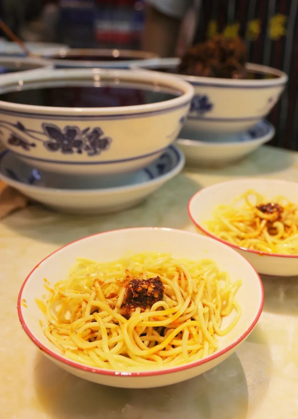 迎泽非遗丨泉娃子家担担面:银鱼落水翻白浪,鲜而不腻色泽亮