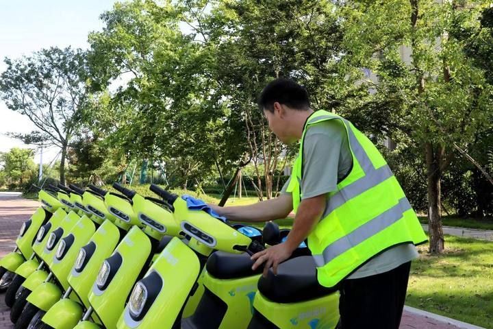 "公交 骑行"零距离换乘,"台州出行"共享电单车在台州湾新区试运行