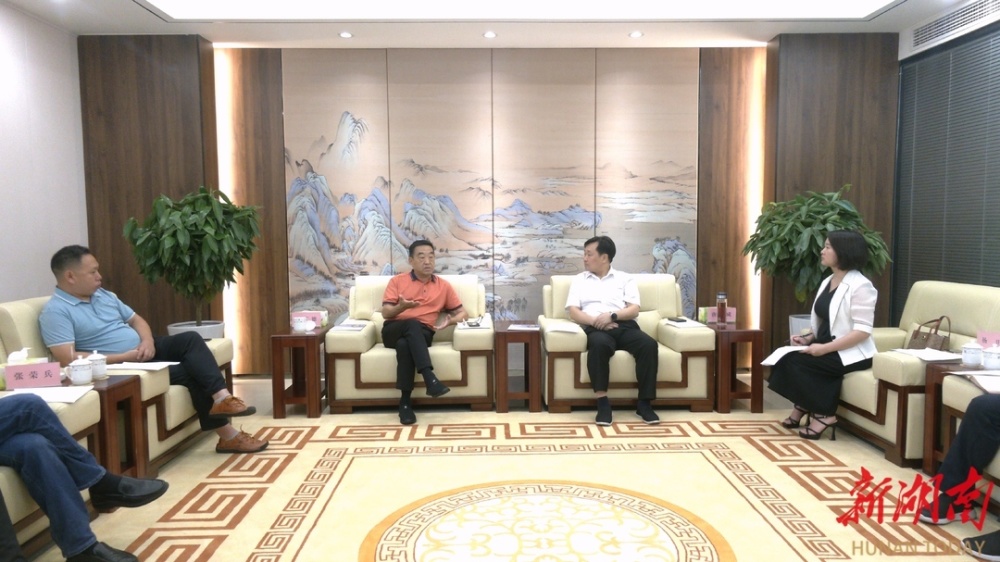 唐成会见刘喜德一行
