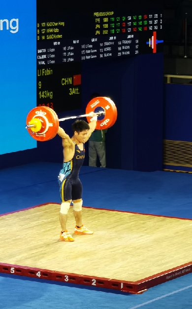 举重队首金李发彬夺得亚运会举重男子61公斤级冠军