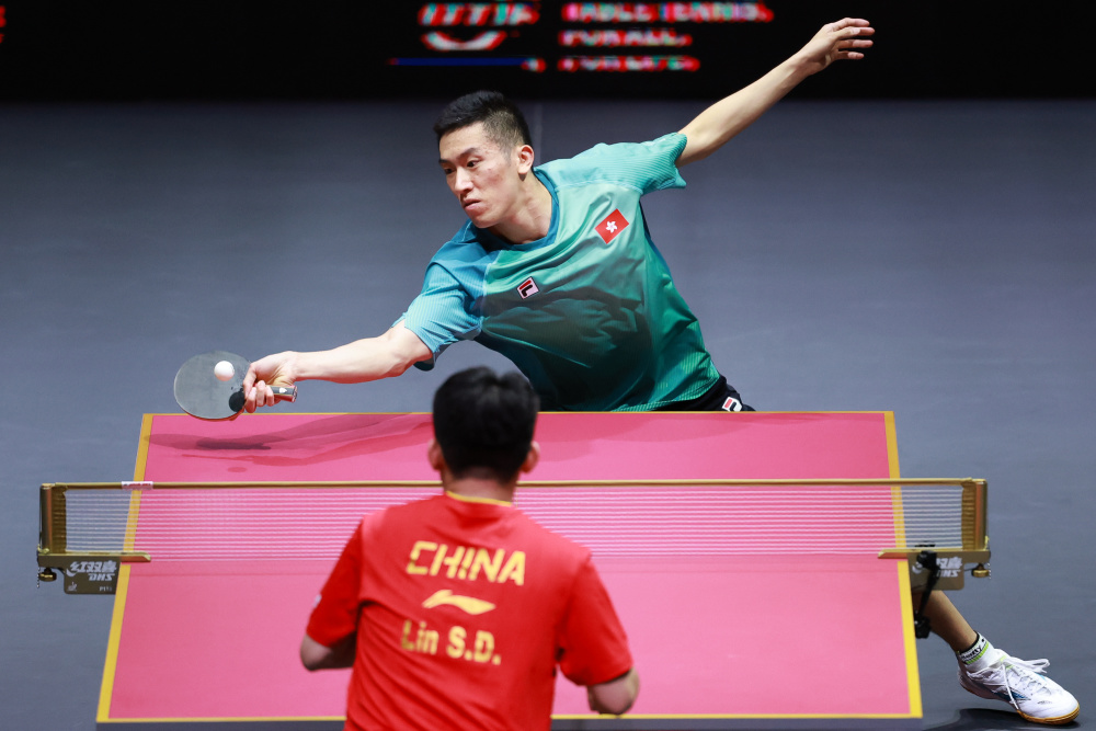 5月20日,林兆恒(上)在比赛中回球