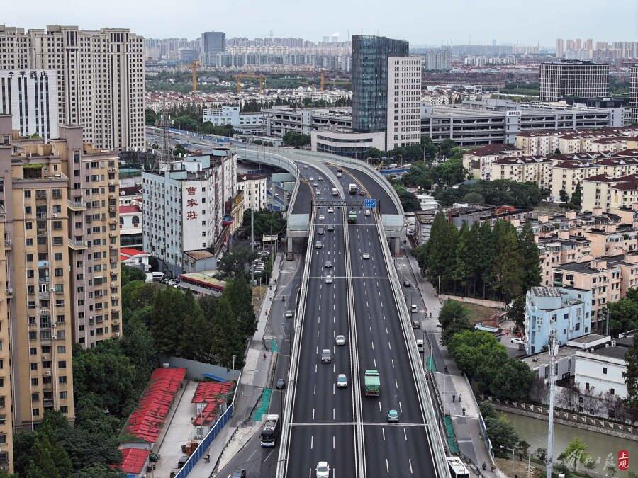 杨高南路改建工程浦三路-成山路跨线桥主线建成通车_腾讯新闻
