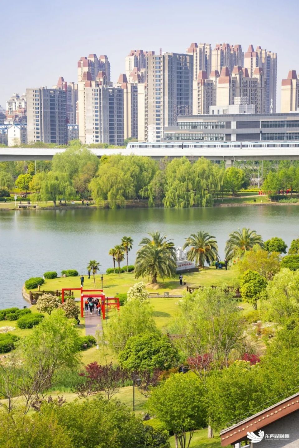 咫尺"下江南"春赏樱,秋赏菊,冬赏梅码头潭公园百余种草木环绕水岸构建