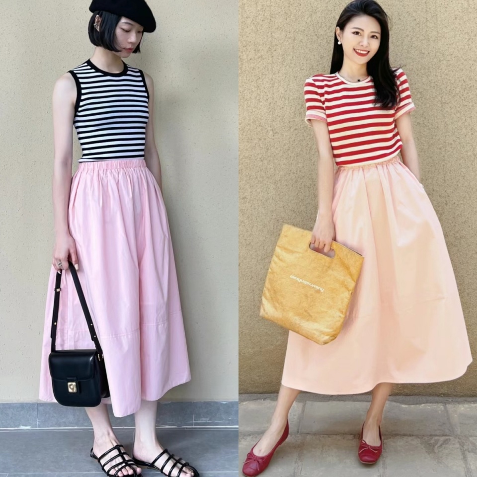 一,条纹衫搭配伞裙条纹衫仿佛有一种魔力,能让你在人群中脱颖而出