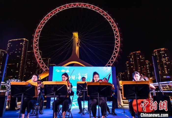 (神州写真)中国城市路边音乐会吸睛_腾讯新闻