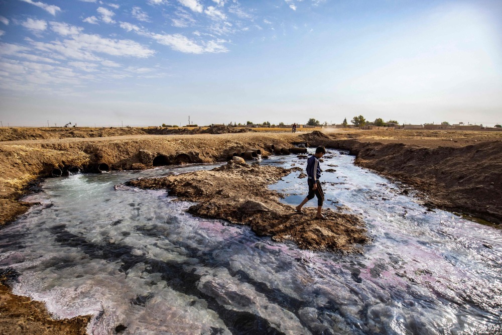 外代一线叙利亚被污染的河流