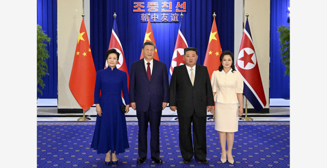 习近平出席金正恩举行的欢迎宴会_腾讯新闻