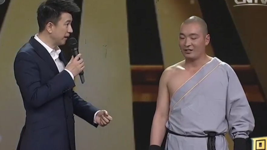 少林小伙拥有硬气功！现场用木棍敲头，让观众都大为震惊_腾讯新闻