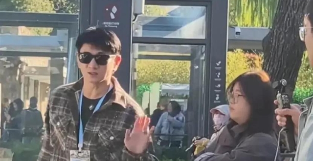 Nicky Wu visits giant panda Meng Lan at the Beijing Zoo