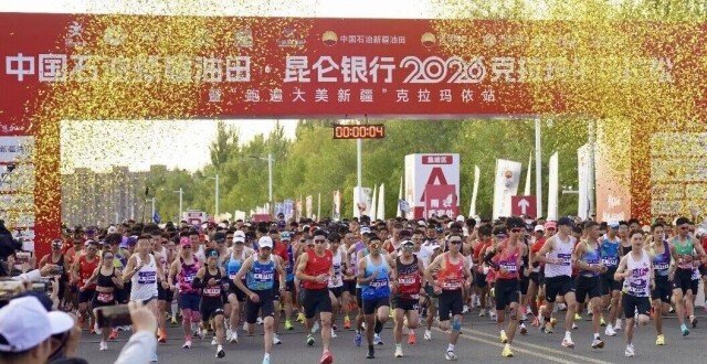 宝妈丁常琴夺西安女子半马冠军
