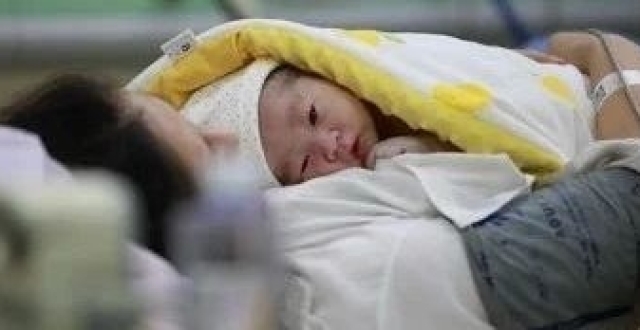 【媒体视角】“双龙宝宝”诞生背后的“人民”坚守_腾讯新闻