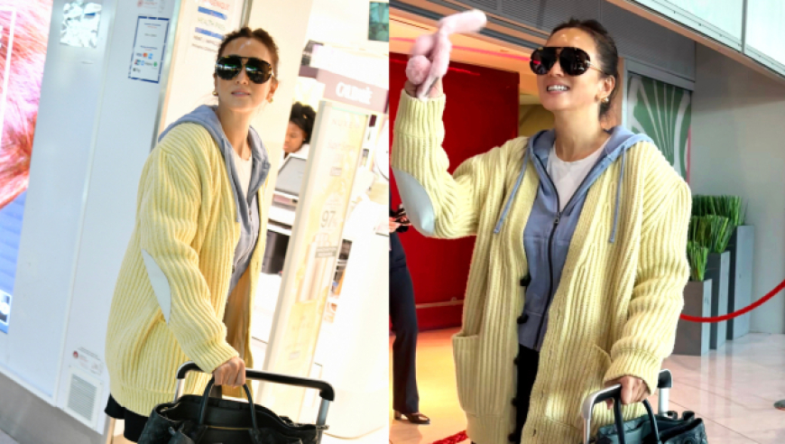 57岁巩俐现身巴黎机场,身材高挑皮肤紧致,年近花甲状态好到爆