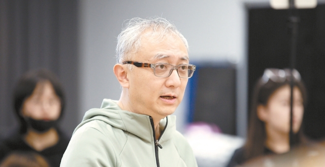 李东：“金牌制作人”的坚守_腾讯新闻