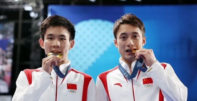 云南小伙杨昊奥运夺金，家乡人民共同见证！_腾讯新闻