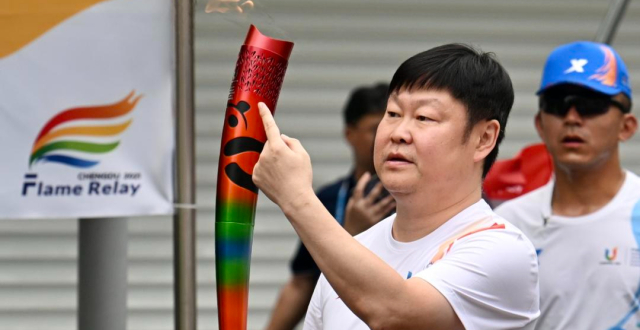 我是大运火炬手丨姚夏：我和艾克森成为火炬手，是对蓉城足球的认可_腾讯新闻